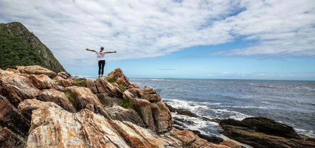 Girl standing on rocks
